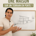 Maison moderne construite sur un terrain en pente avec aménagement extérieur soigné.